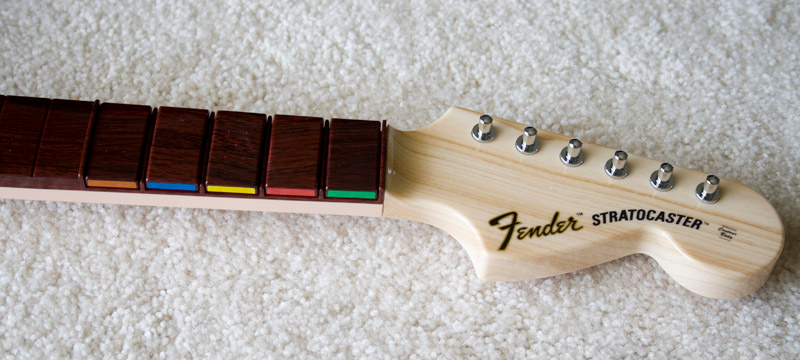 Illustration for article titled Rock Band 2 Wireless Guitar and Drums Hardware Review